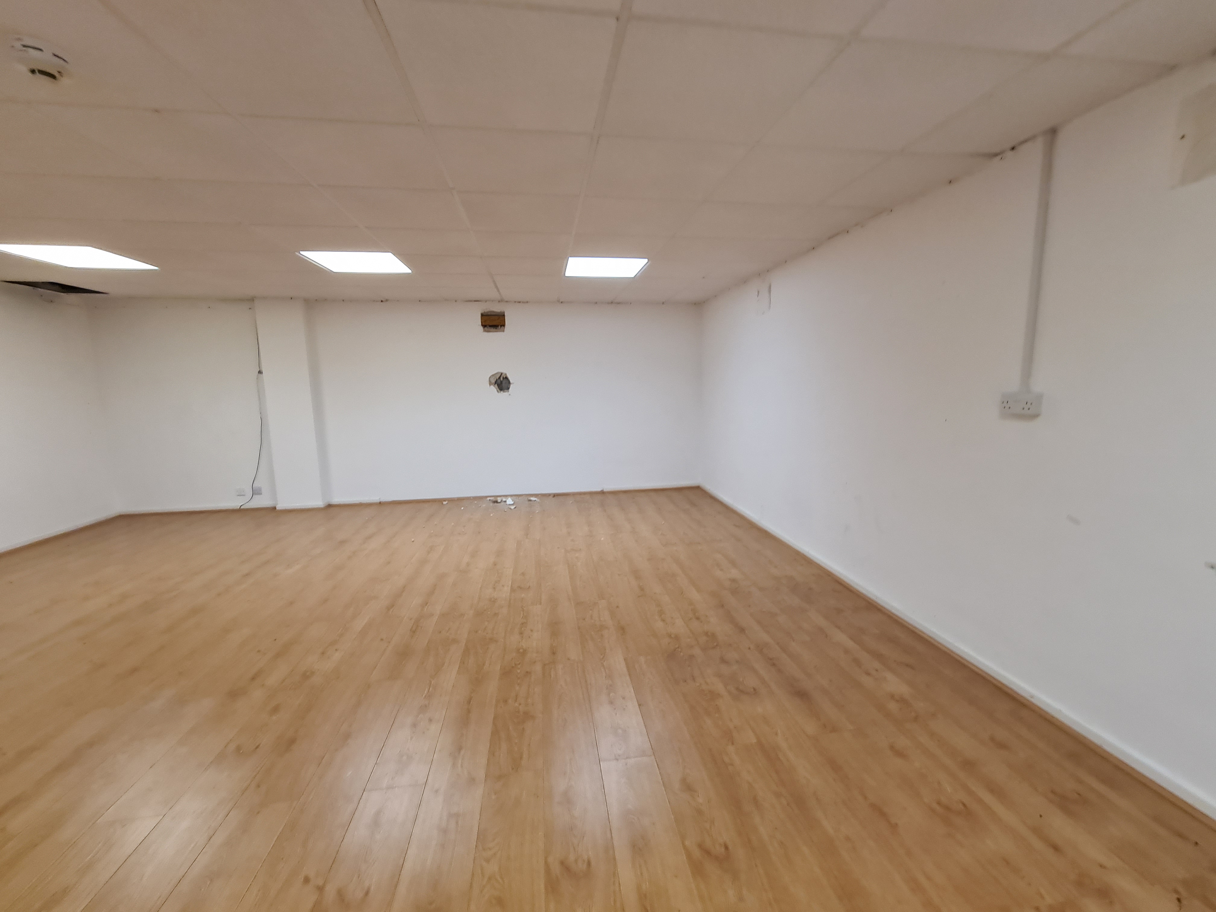 Empty room with a wooden floor